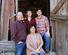 New principal, his wife and 2 boys